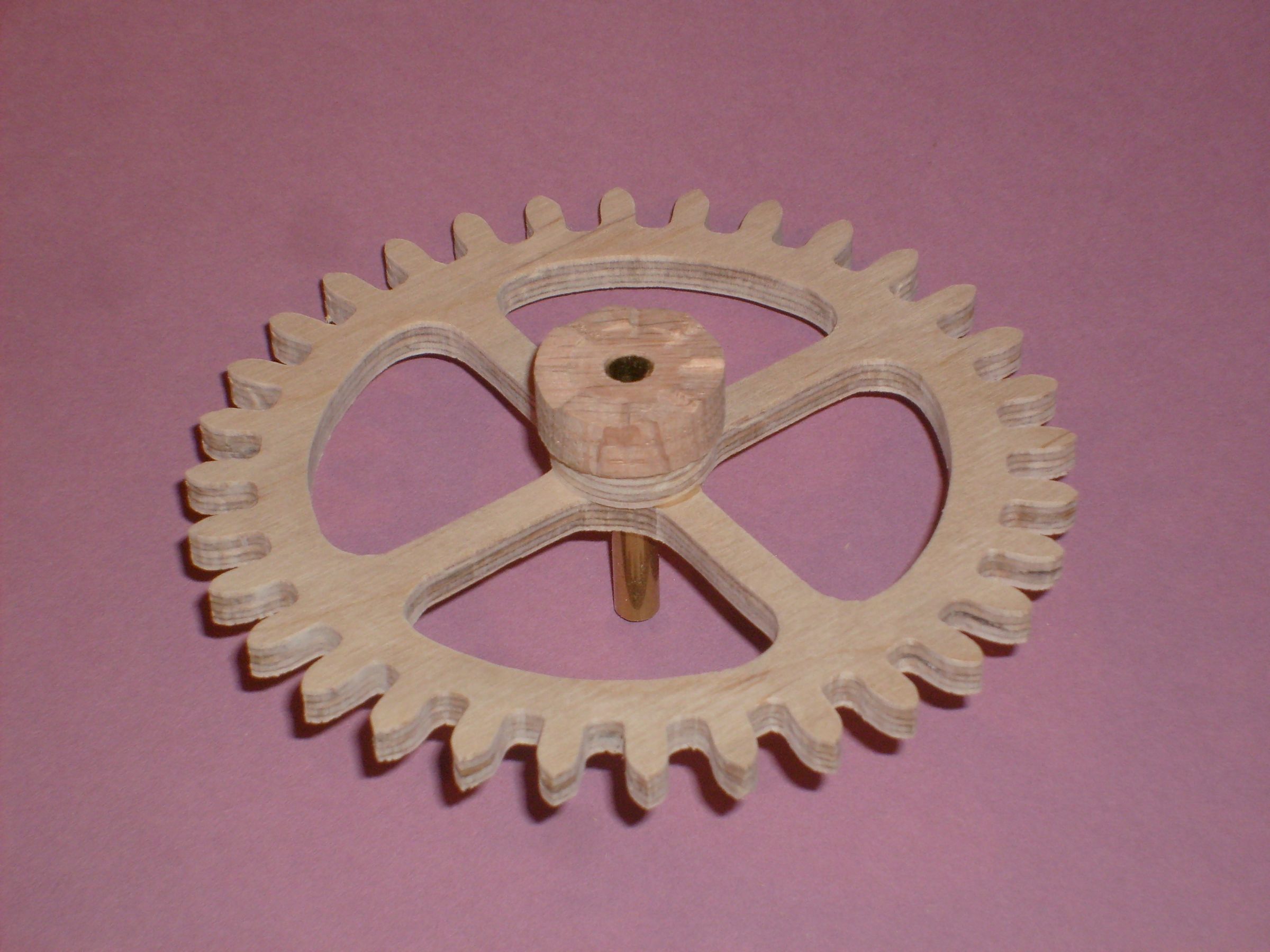 A Wood Gear Clock With a Unique Drive Mechanism 34 Steps (with