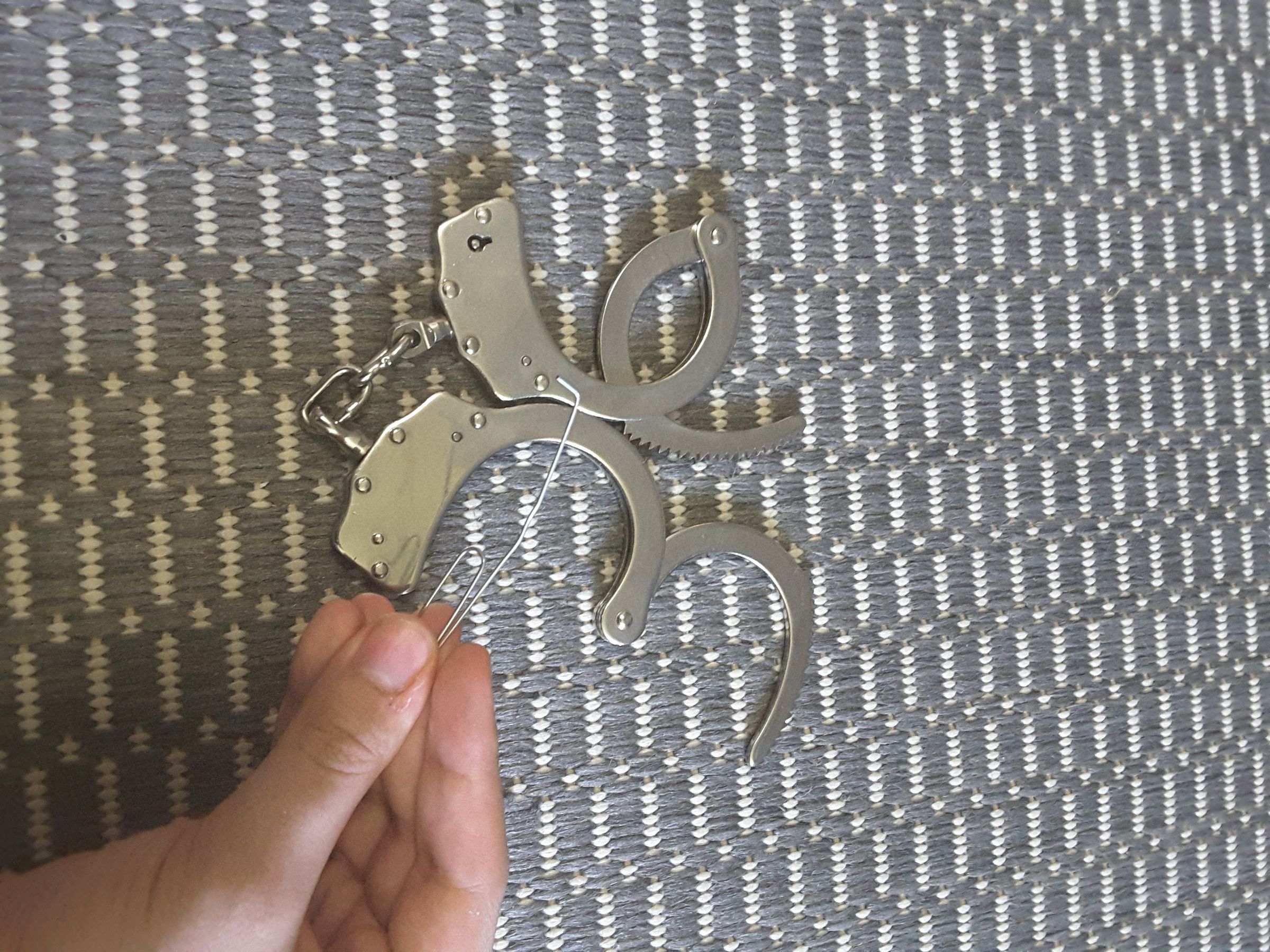 How to Pick Police Issue Handcuffs With a Paperclip 7 Steps