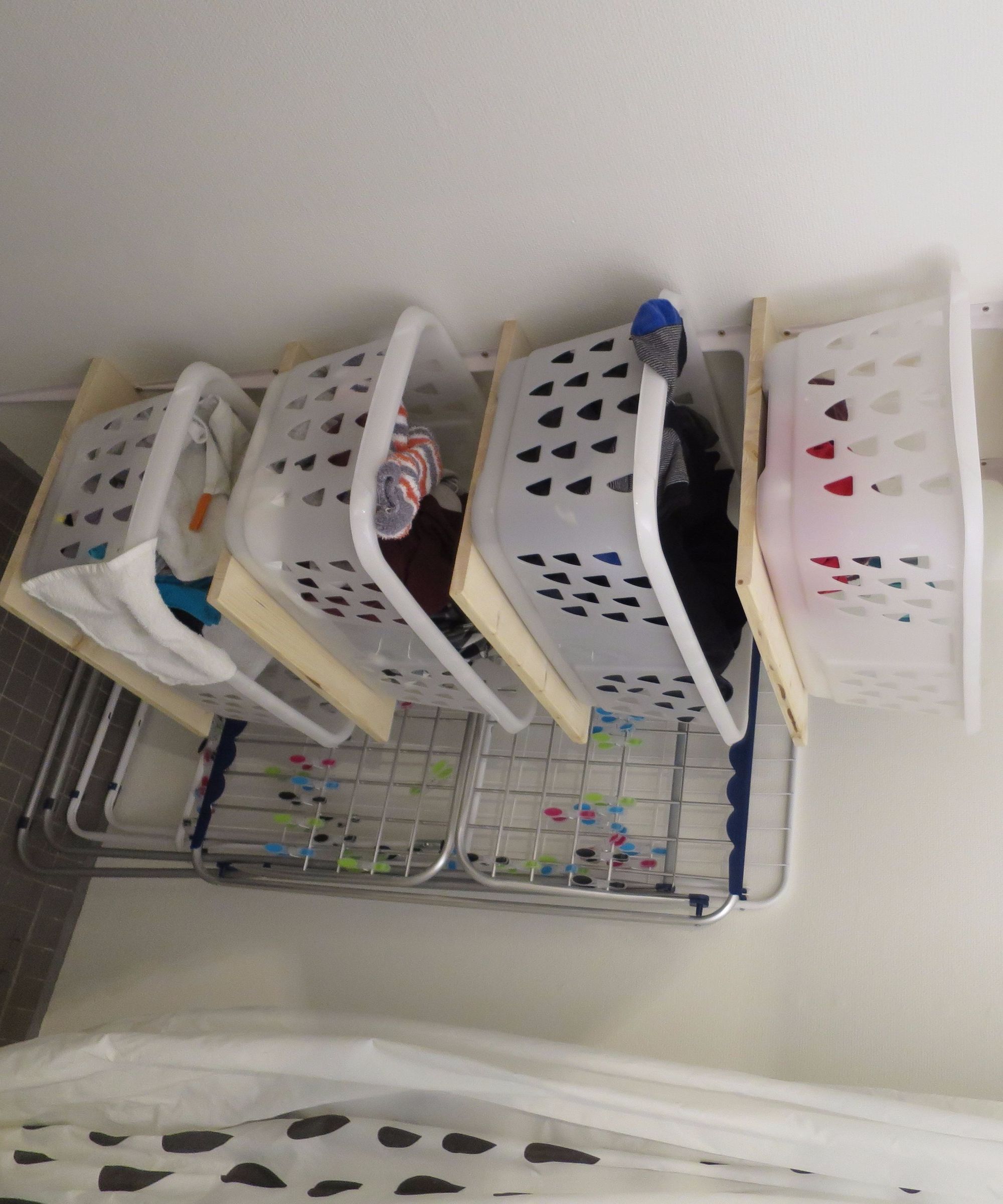 Space saving laundry sorting system