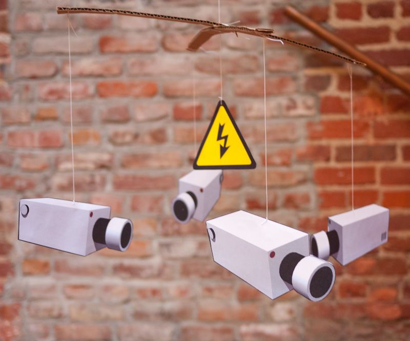 Banksy-style CCTV Mobile