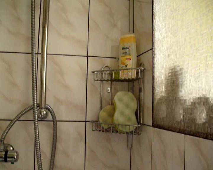 The Assembly of Shelf in Shower Cabin.
