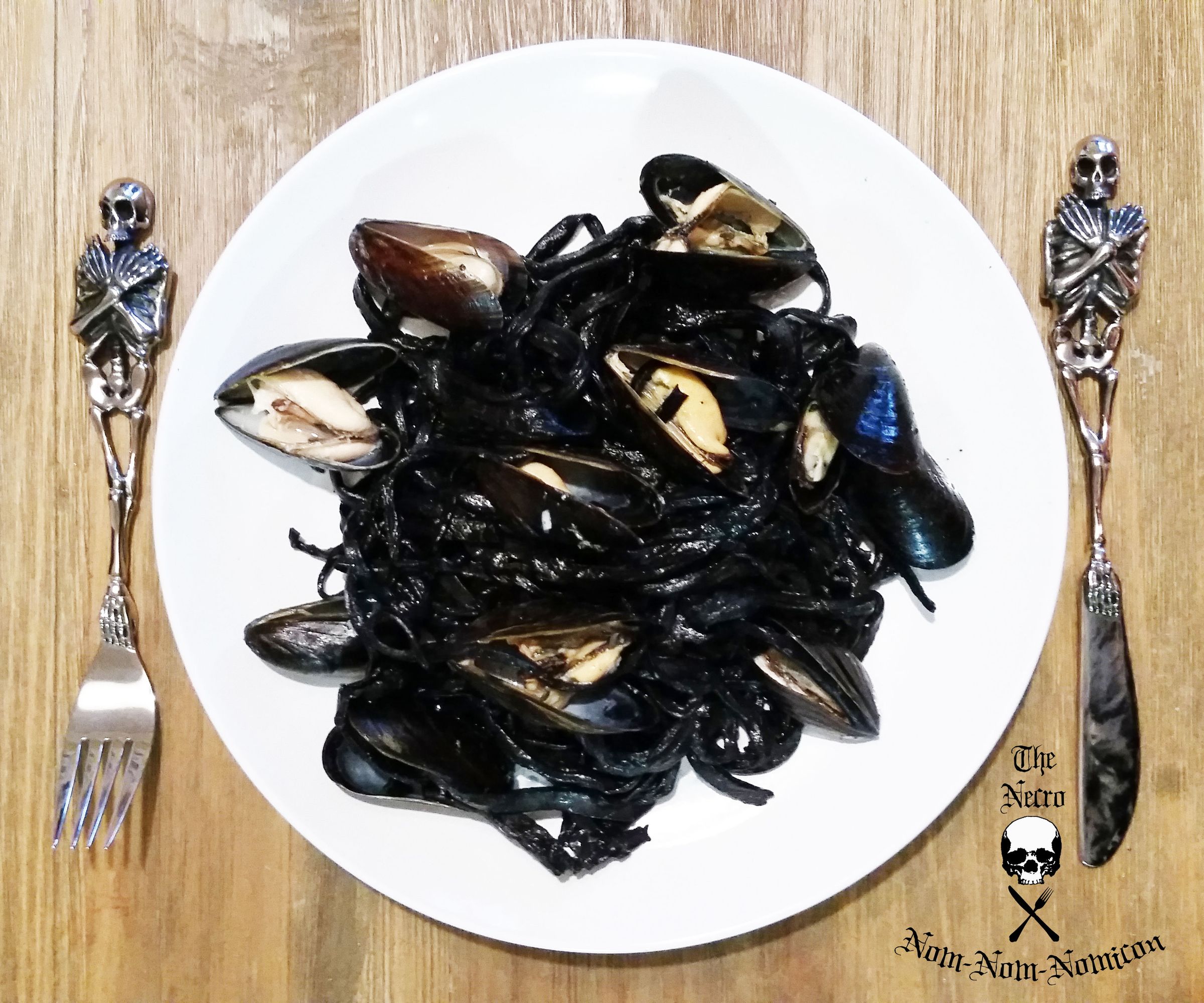 Cephalopod Tendrils With White Wine Steamed Bivalves