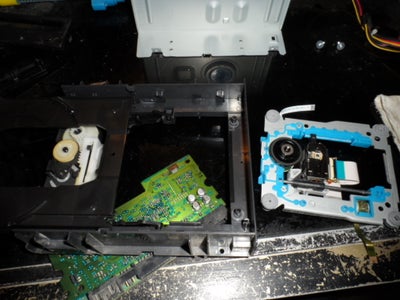 Retirar Unidad Óptica / Remove Optical Drive