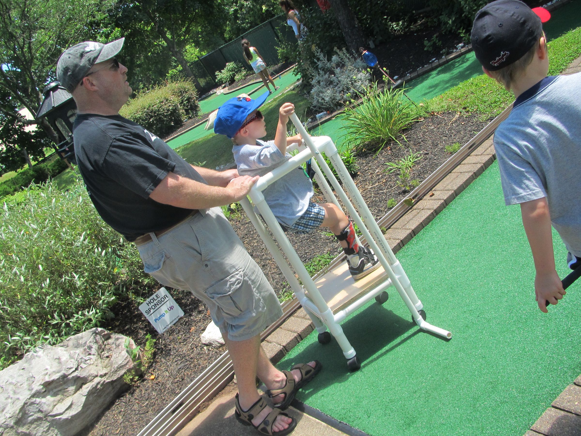 Accessible Scooter With Putt-putt Attachment