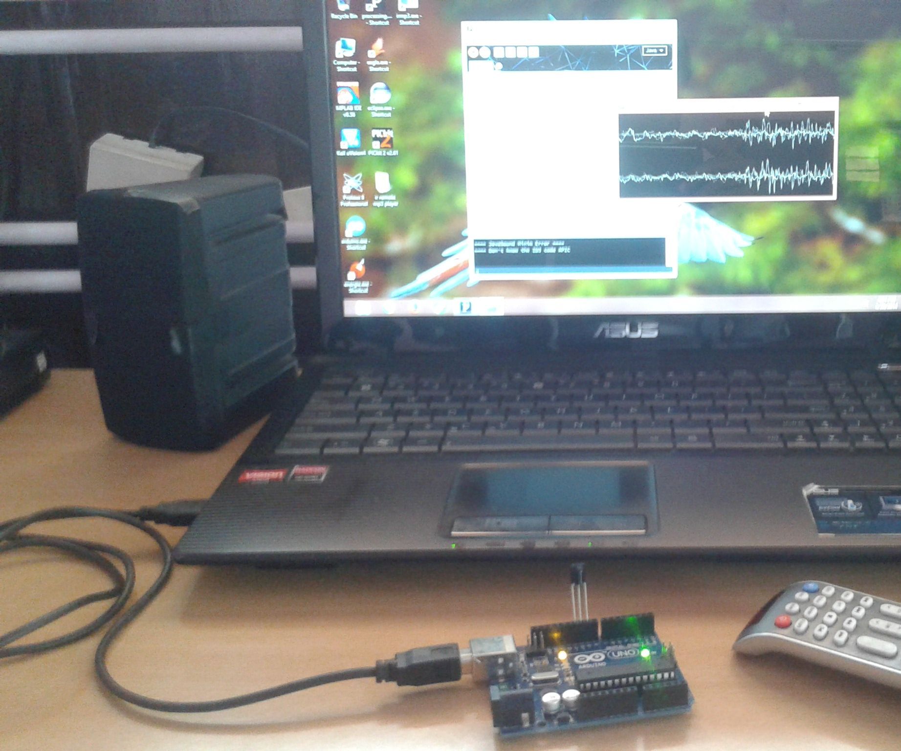 TV REMOTE CONTROLLABLE COMPUTER MP3 PLAYER USING ARDUINO AND PROCESSING