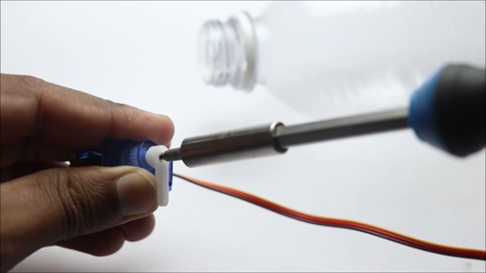Building Feed Tap Mechanism