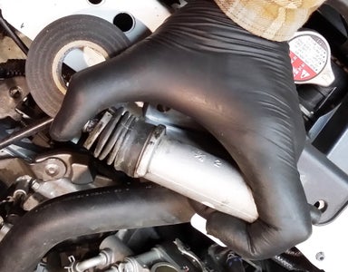 Disconnect Hydraulic Line Clips and Slave Cylinder