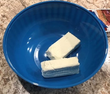 Unwrap Both Cream Cheese Boxes and Put Them in the Bowl 