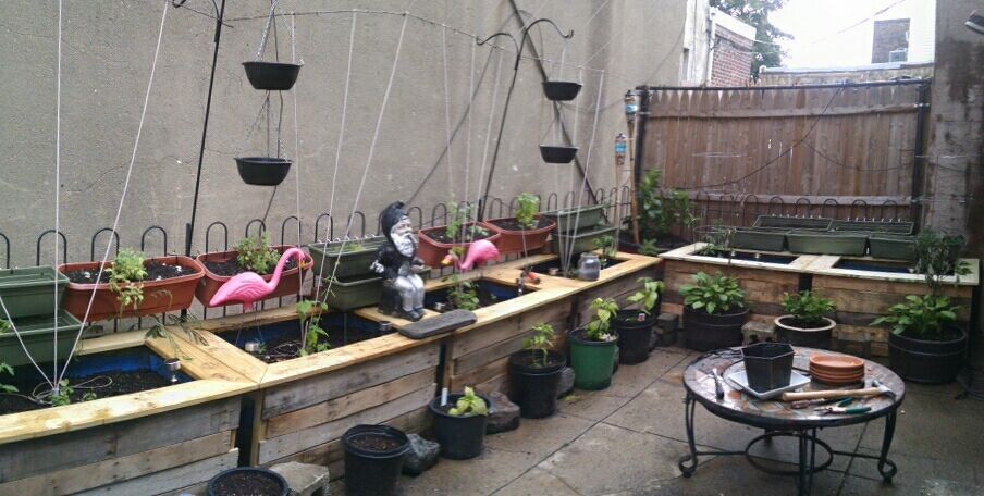 Outdoor Planters From Rain Barrels and Pallets