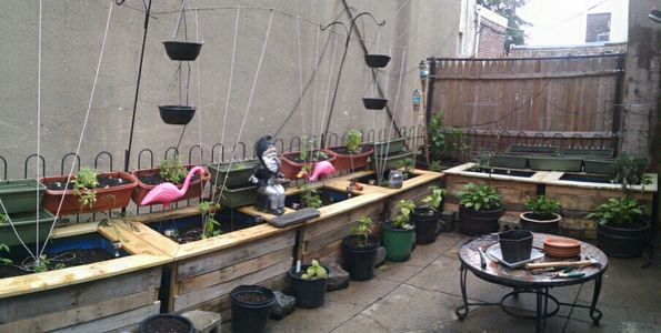 Outdoor Planters From Rain Barrels and Pallets
