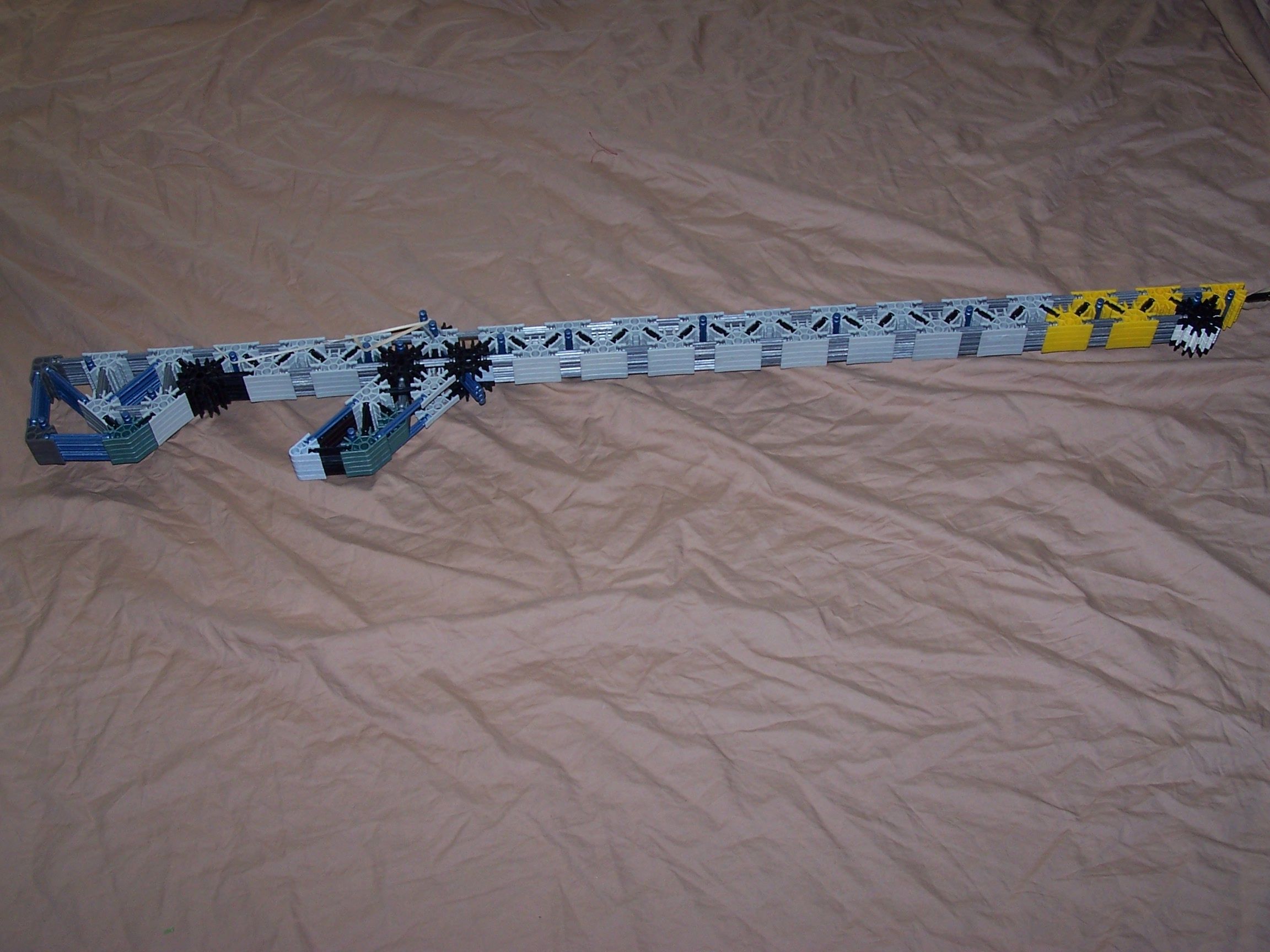 rubberband gun/ block ammo/rod ammo gun, pretty dang far!