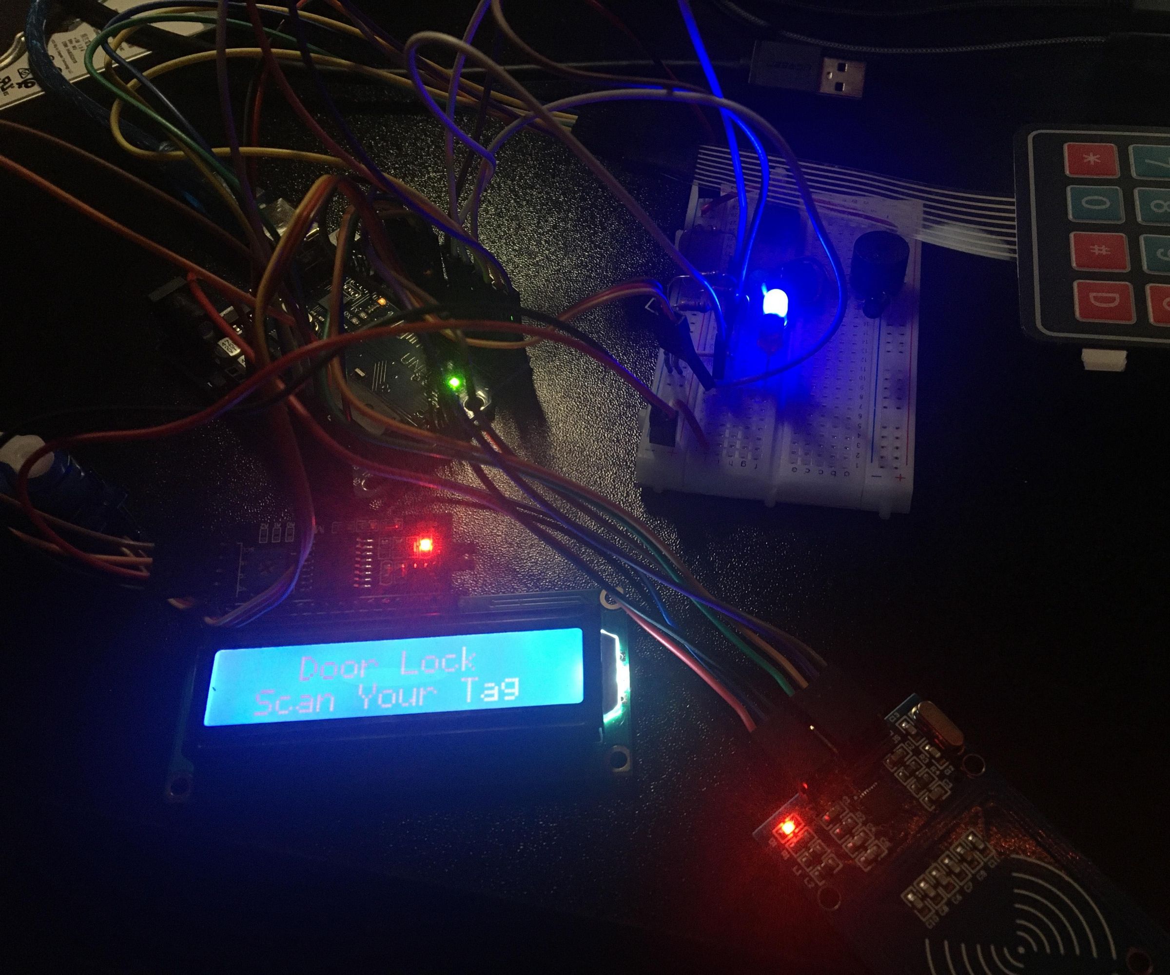 Access Control System With 555 Timer, RFID, LCD, and Keypad