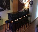 Make a 'home bar' from old Ikea furniture, wallpaper and imagination