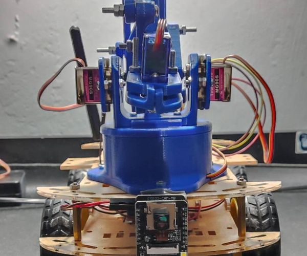 Surveillance Robot With Robotic Arm