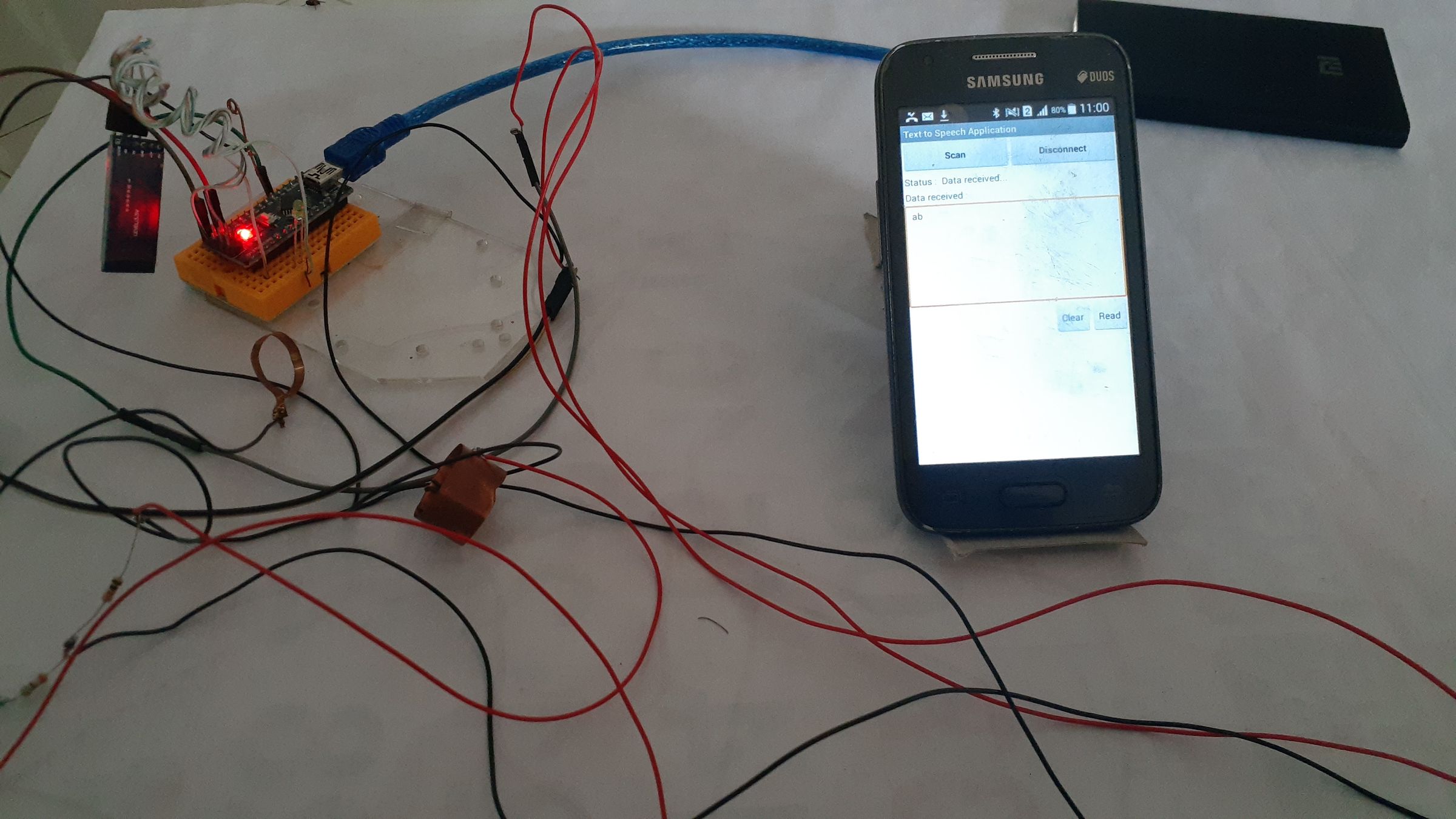 Wearable Keyboard on Fingers That Leads to Word Pronunciation on Phone