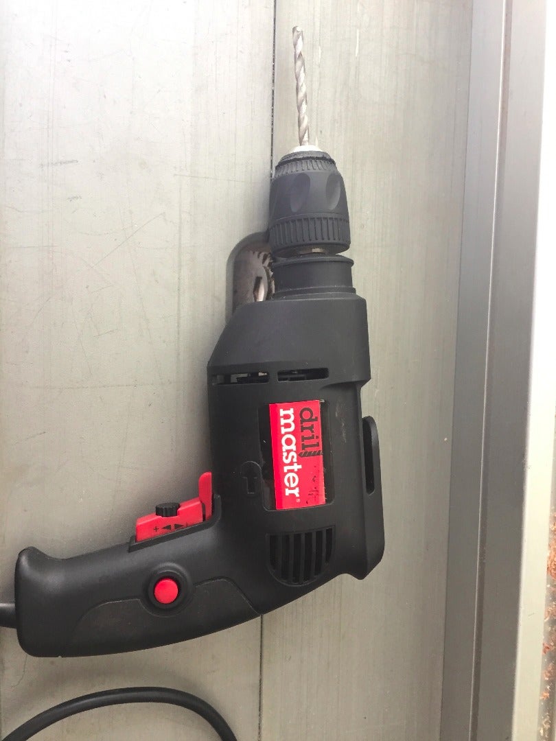 Attach Rubber Stoppers to the Mounting Holes