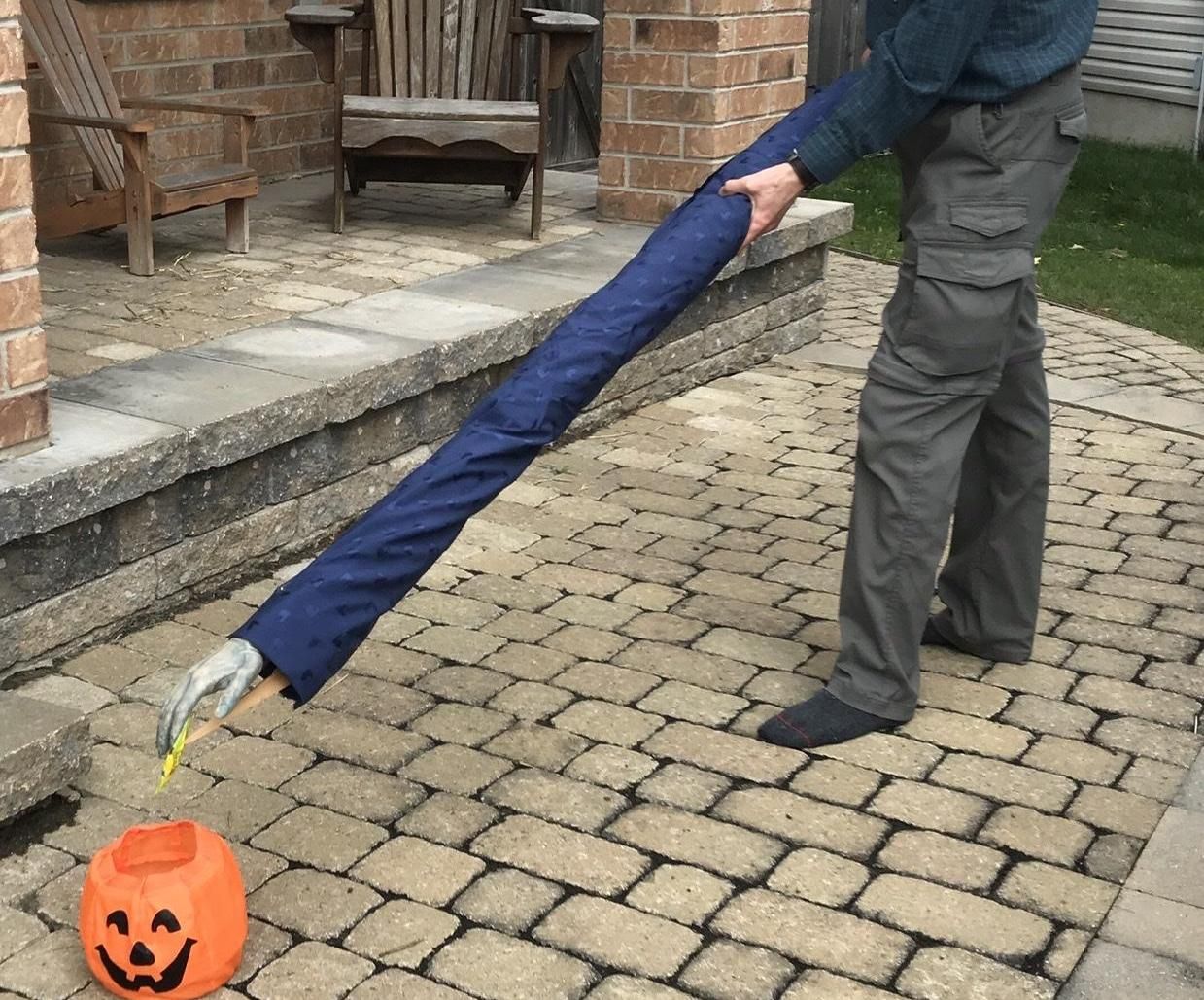 Social Distancing Zombie Hand Halloween Candy Dropper