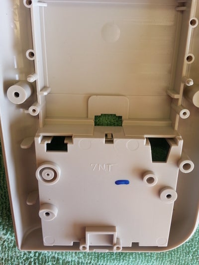 Dis-assembly of Holster, Game Boy, and Wiimote