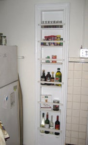 Convert an Old Ironing Board Nook Into a Spicy Spice Rack