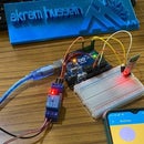 Controlling a Light Bulb Via Bluetooth HC-06 and Relay Module