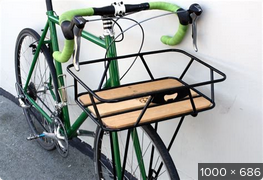 Secure the Clamped Baskets to the Top of the Front Touring Rack.