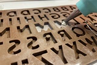 Pouring Hot Glue in the Moulds 