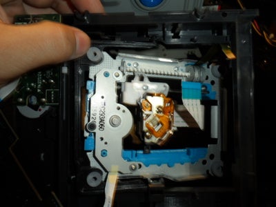 Retirar Unidad Óptica / Remove Optical Drive