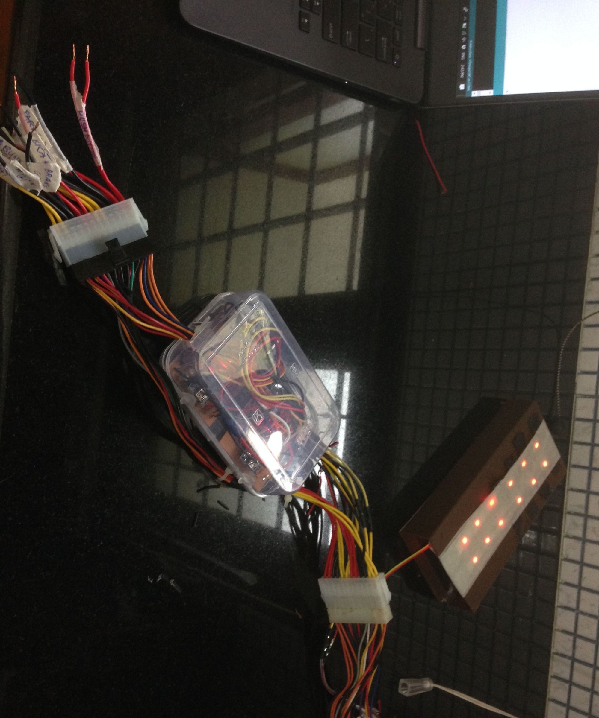 Motorcycle Tail Lamp With Integrated Blinkers Using Programmable LEDs