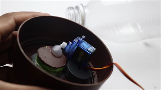 Building Feed Tap Mechanism