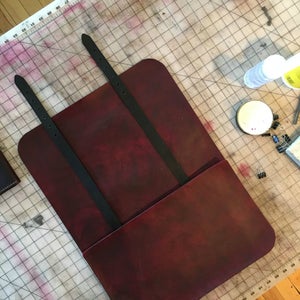 Set Your Straps to the Back Pocket and Glue the Back Pocket to the Back of the Bag. 