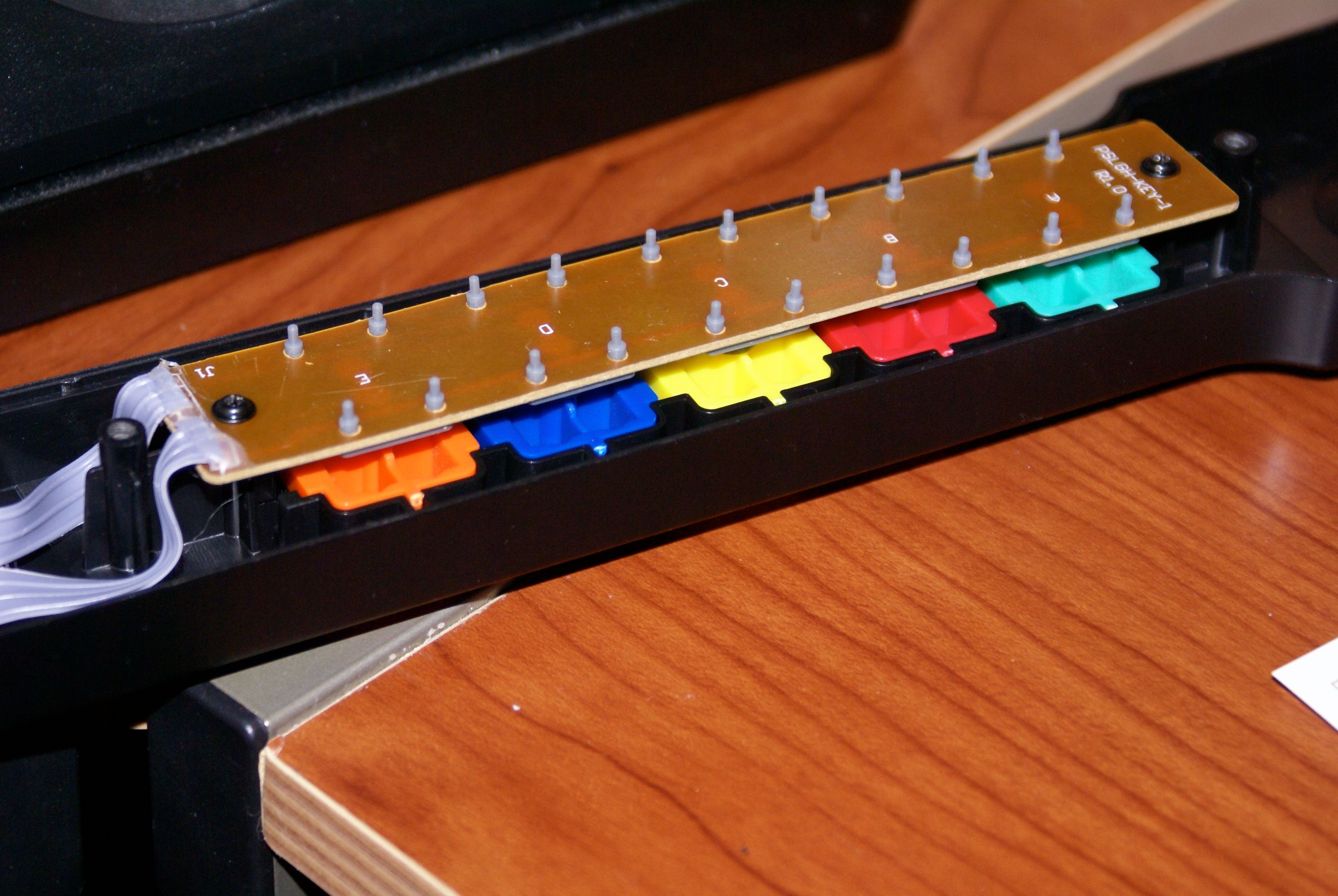 How to Disassemble a Guitar Hero SG Controller for Painting 6 Steps