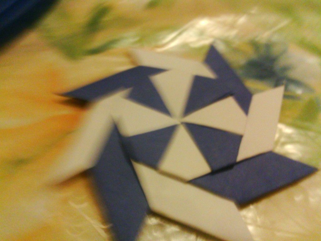 how to make a paper transforming disc