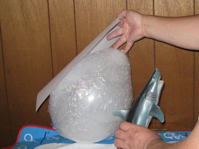 Build Up the Shape of the Shark Around the Balloon Using Cardboard