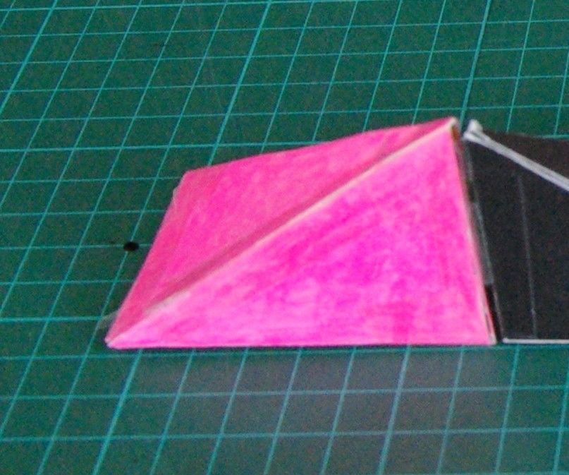 Construct a Regular Tetrahedron From Two Pairs of Congruent Non-regular Tetrahedra Which Are Mirror Images of Each Other