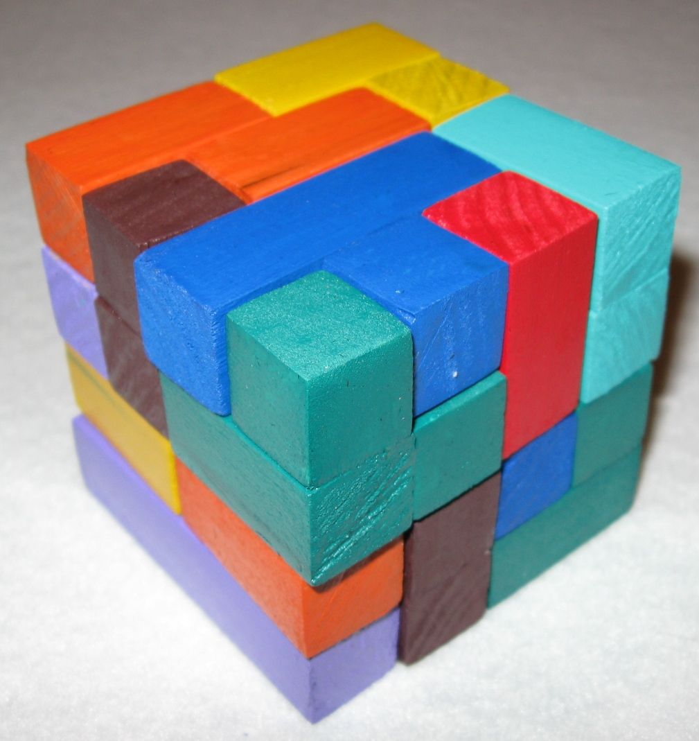 How to Make Quadrominoes or Four Cubed