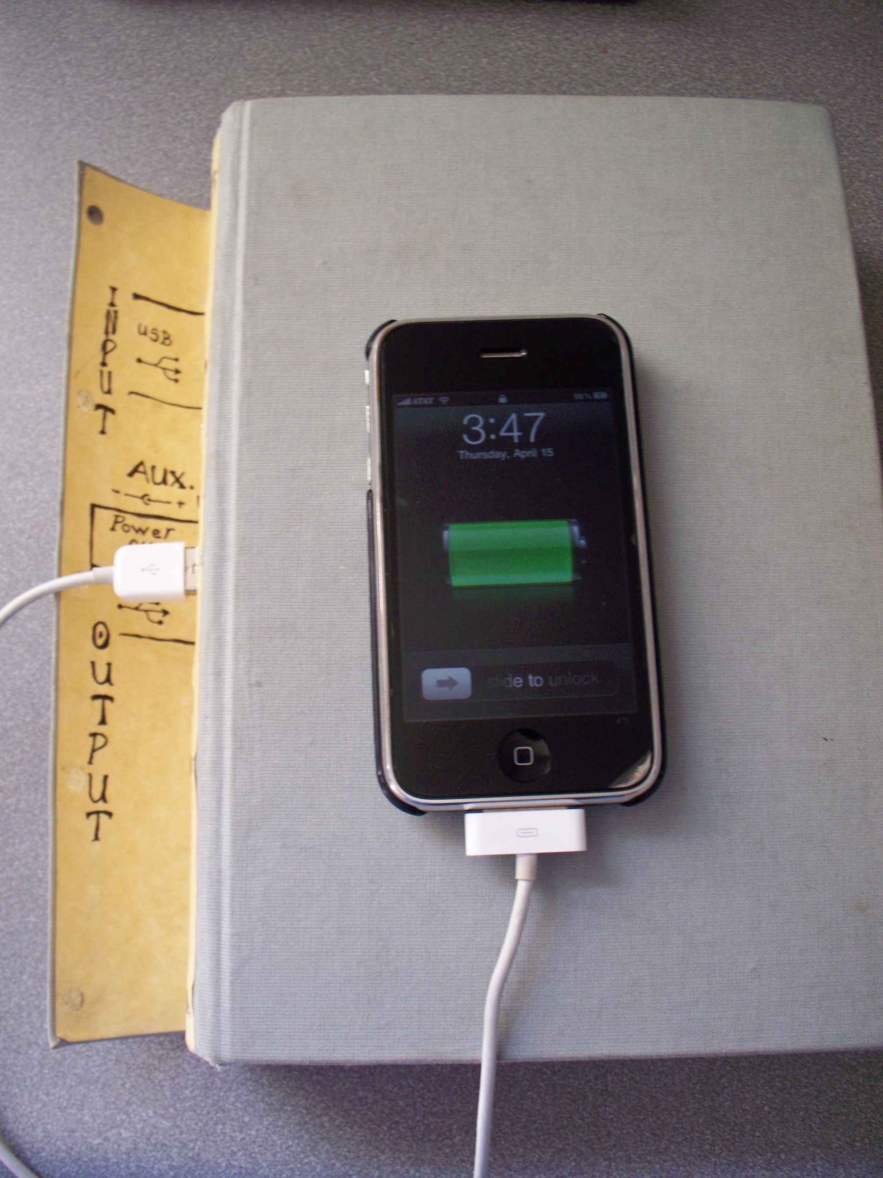 Solar powered iPhone charger and Arduino in a book