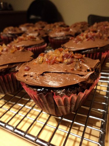 Caramel Filled Gooey Chocolate Cupcakes With Chocolate Frosting and Bacon Bits