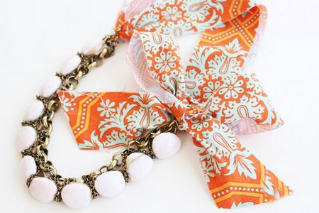 Finish the Stunning Diy Fabric Jewelry Necklace by Tying a Pretty Bow Knot.