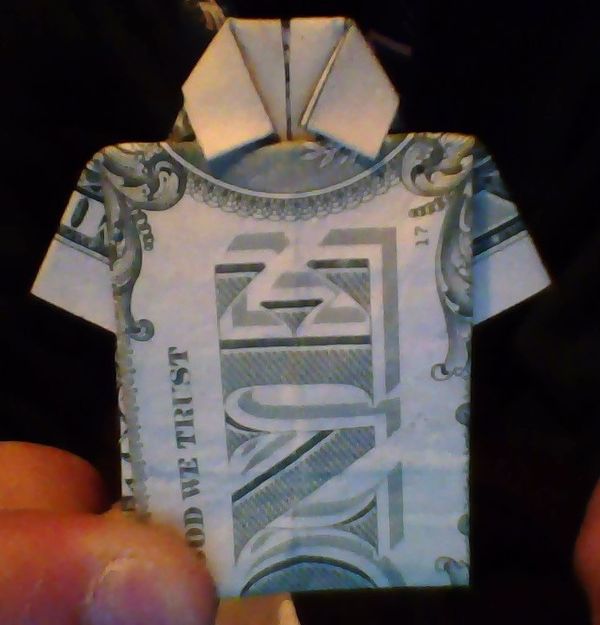 How to Fold a Shirt Using a Dollar Bill