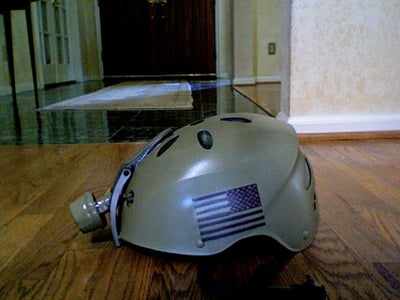 Special Forces Helmet From an Old Flashlight and an Old Bike Helmet.