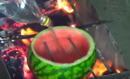 Cut Off the Top of a Watermelon, Remove Flesh, and Put Frozen Ravioli Inside the Watermelon.
