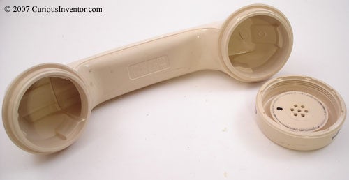 Unscrew the Speaker and Microphone Caps and Remove Innards