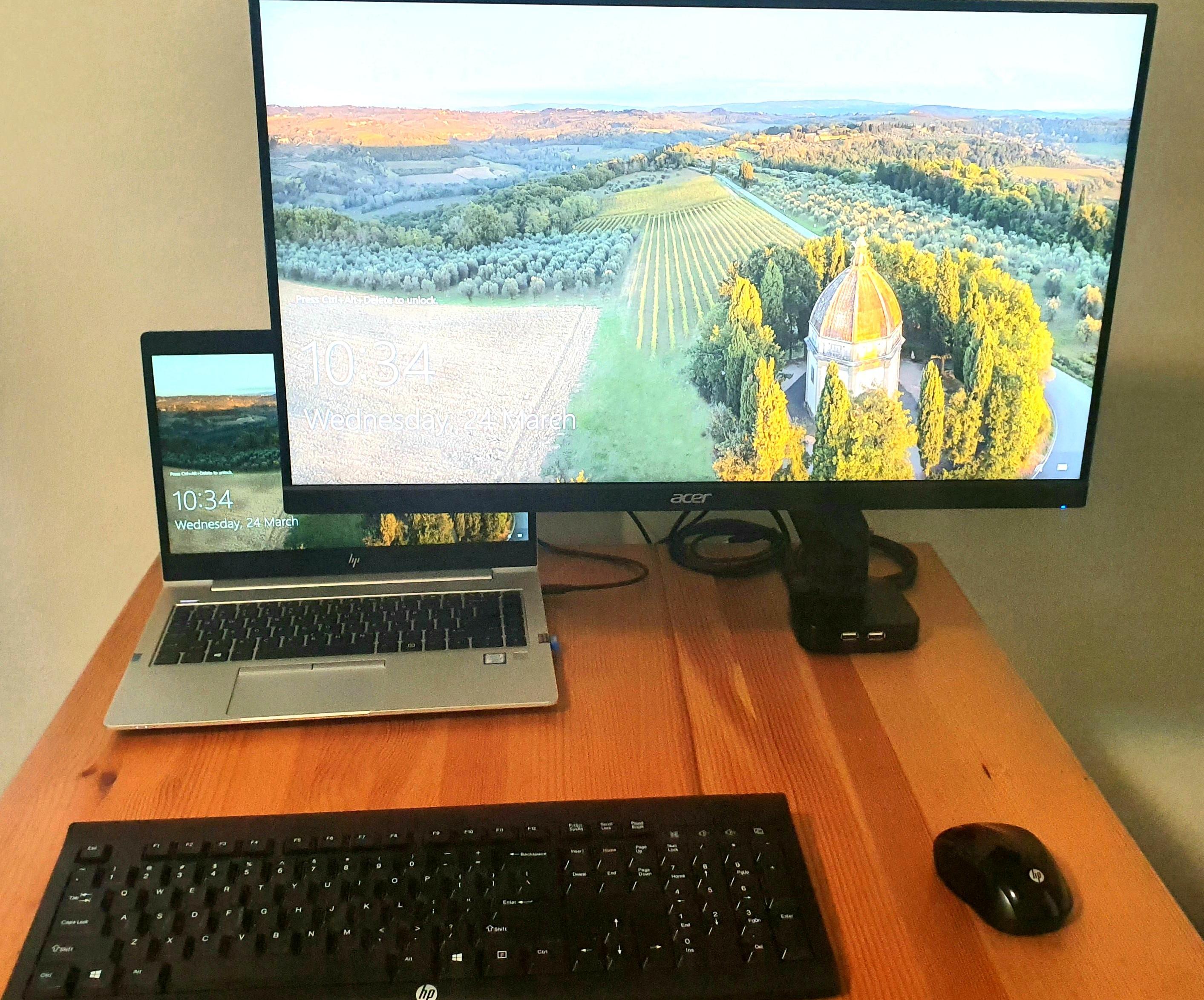 Installing a Computer Monitor Arm Through a Wooden Desktop