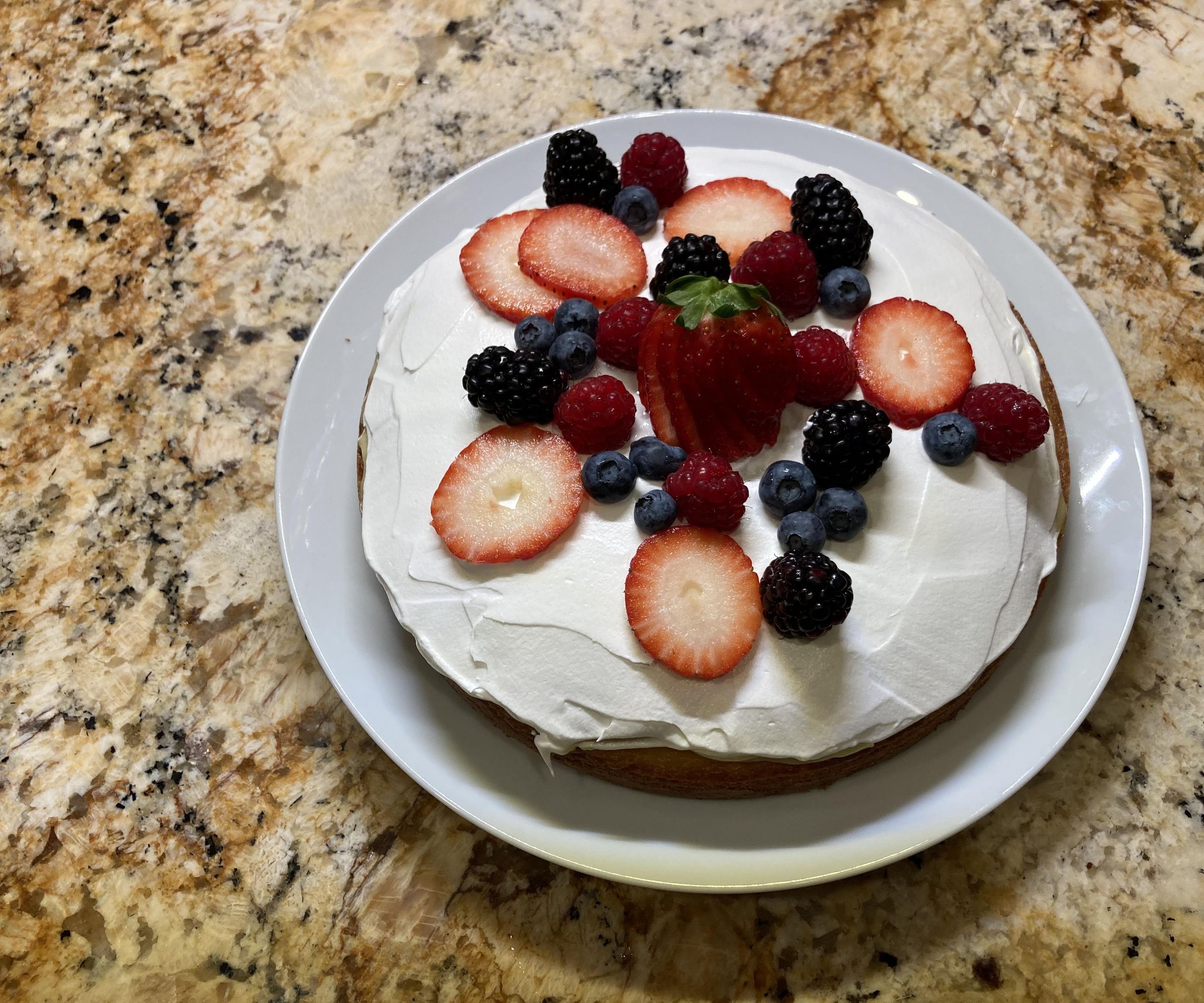 Vanilla and Lemon Pudding Cake With Fresh Berries