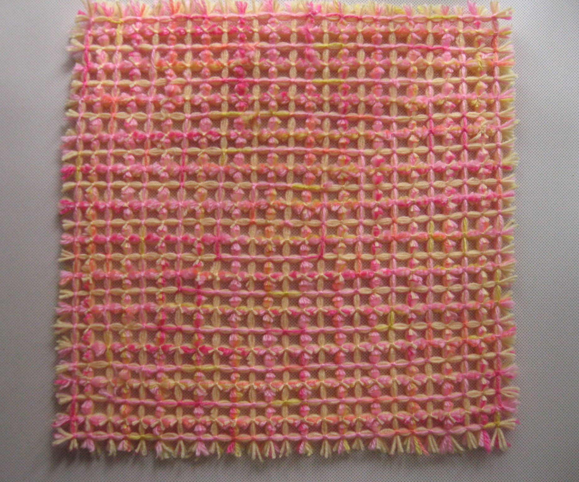 How to Weave a Mat With Small Pom Poms