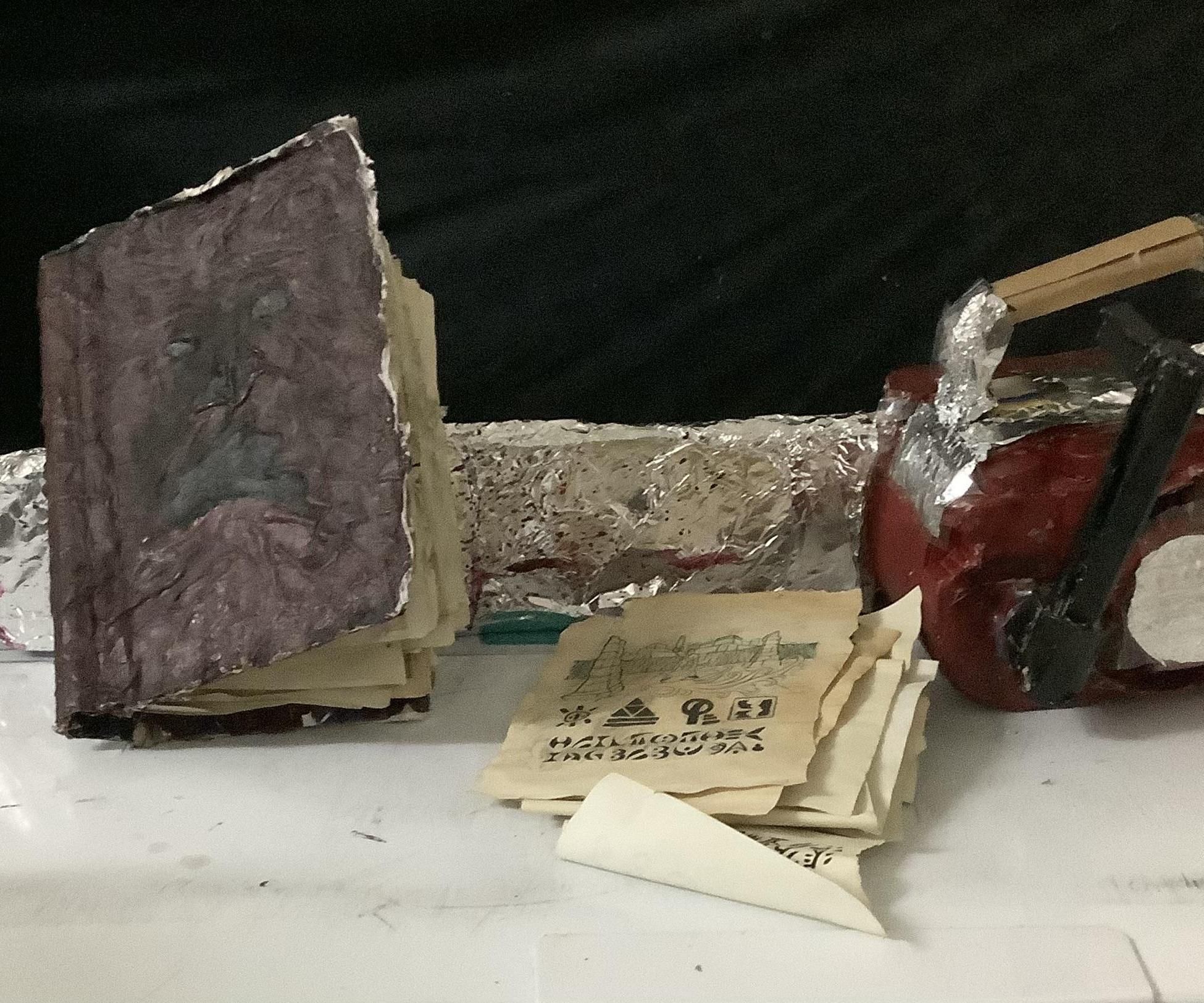 Cardboard Ash Chainsaw Arm and Necronomicon Prop From Evil Dead