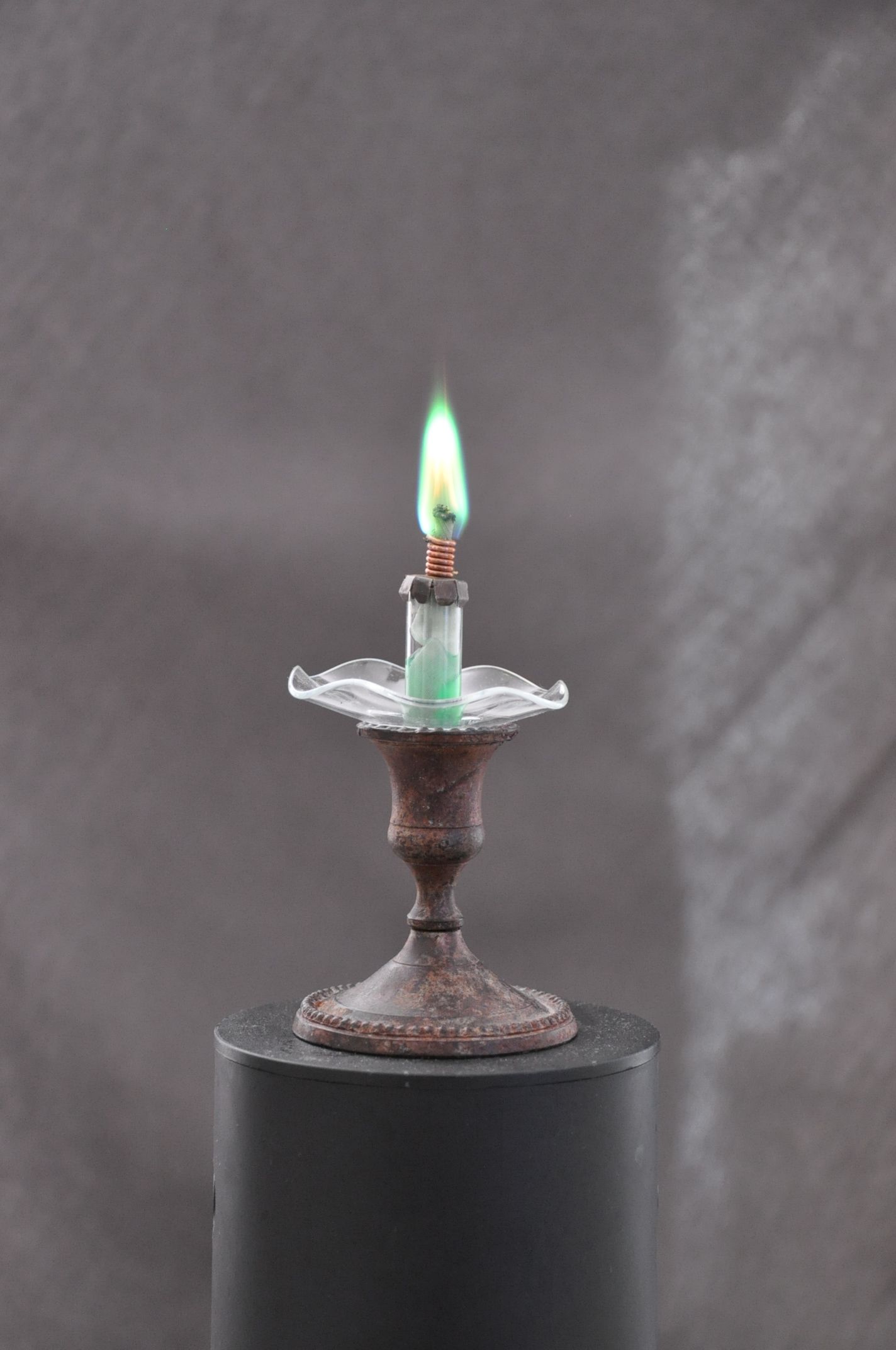 Etching waste green/blue candle