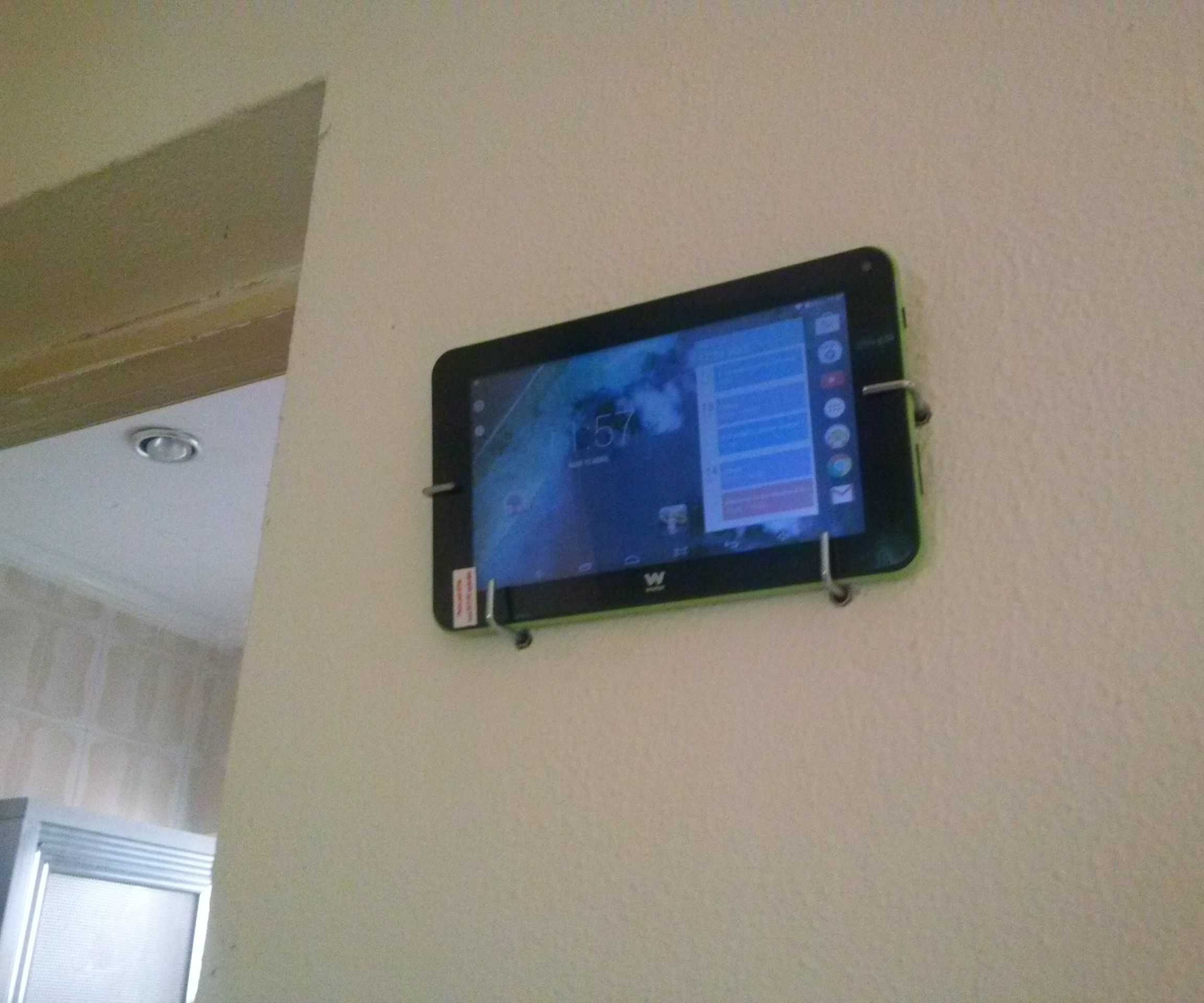 Easy Tablet Stand for the Wall (drill, Hooks and Plastic Anchors).