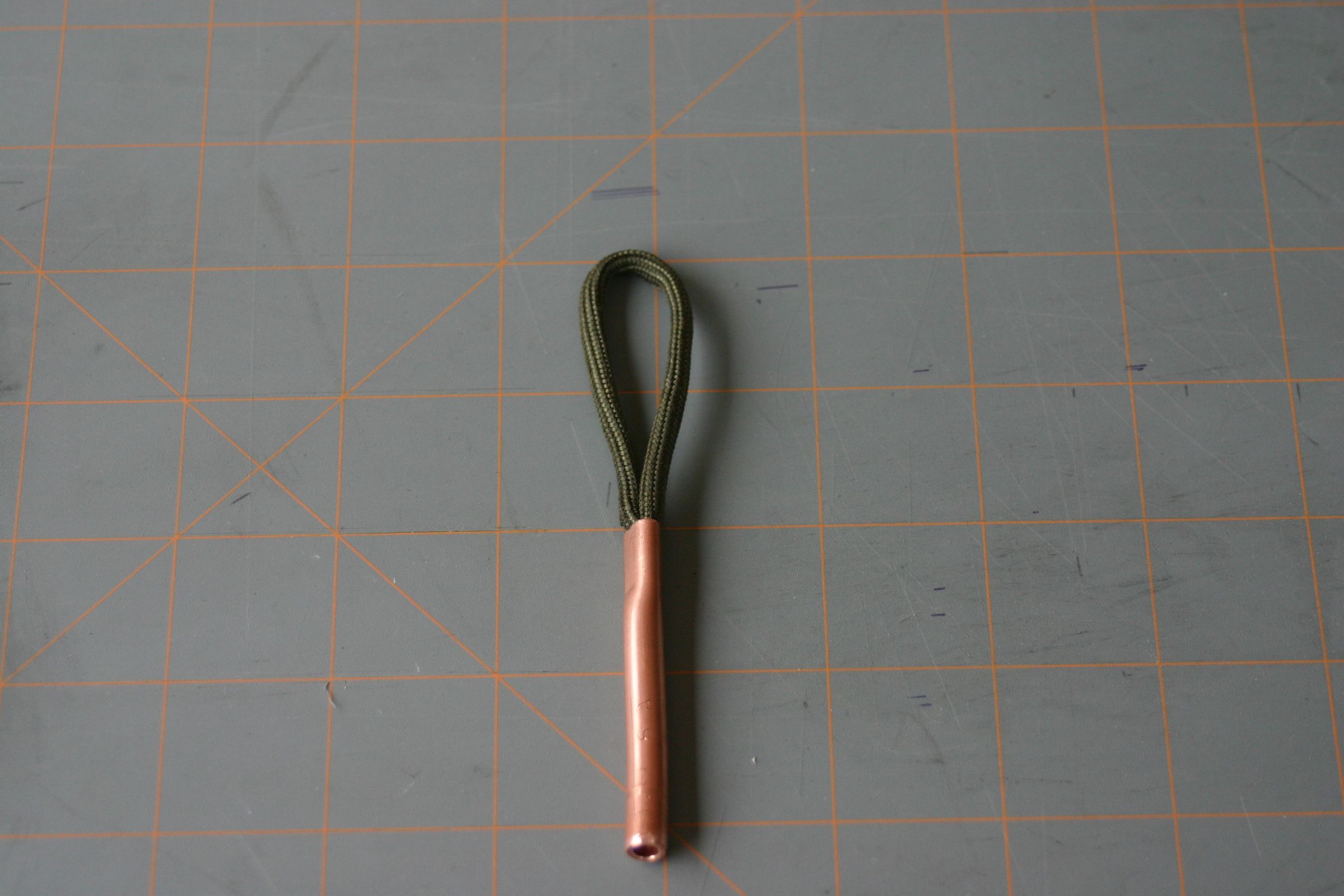 BUTTONHOLE PUZZLE (POCKET SIZED)