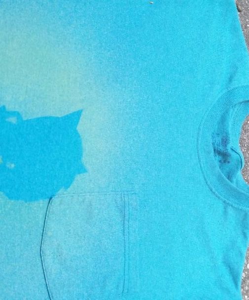 Spraying Bleach to Create Silhouette T-Shirts